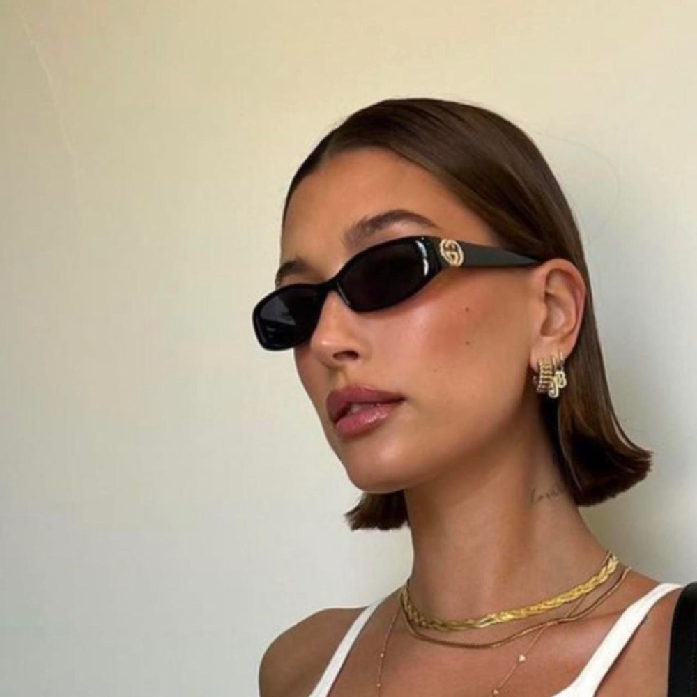 Gucci Authentic GG0517S black sunglasses with gold rim - seen on Hailey Bieber!